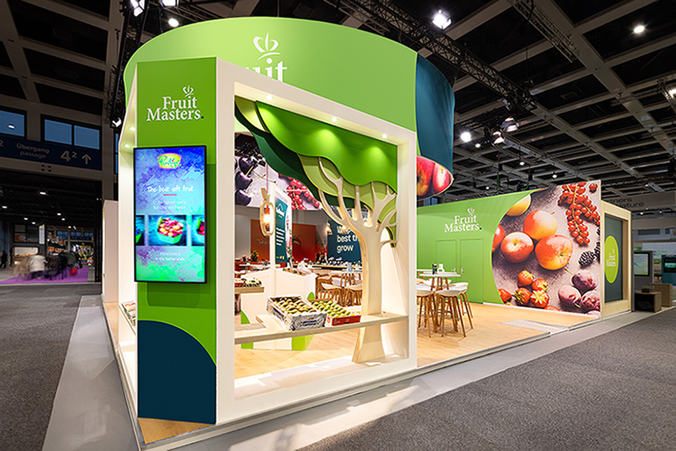 Engaging Stand Design of Fruitmasters at the FRUIT LOGISTICA exhibition. Designed and realized by booth builder Eldee Expo Experts.